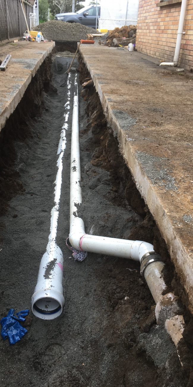 Residential drain laying
